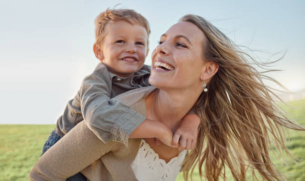 Mother playing with child - no more back pain